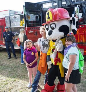 Kids with the fire safety mascot at the 2026 Yamboree