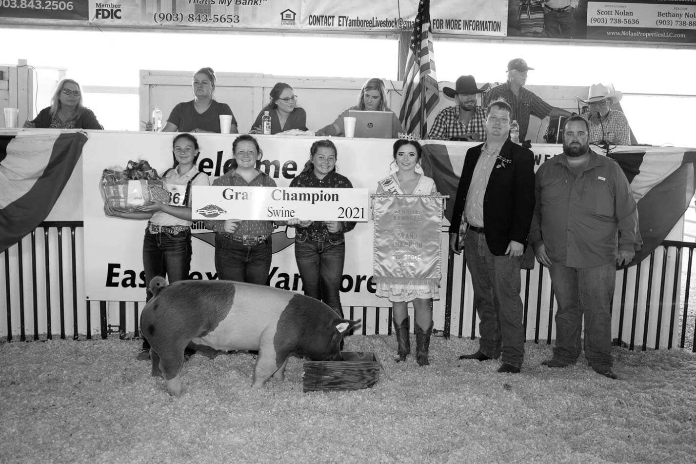 Queen Hannah Jean Henson with the swine contest grand champion